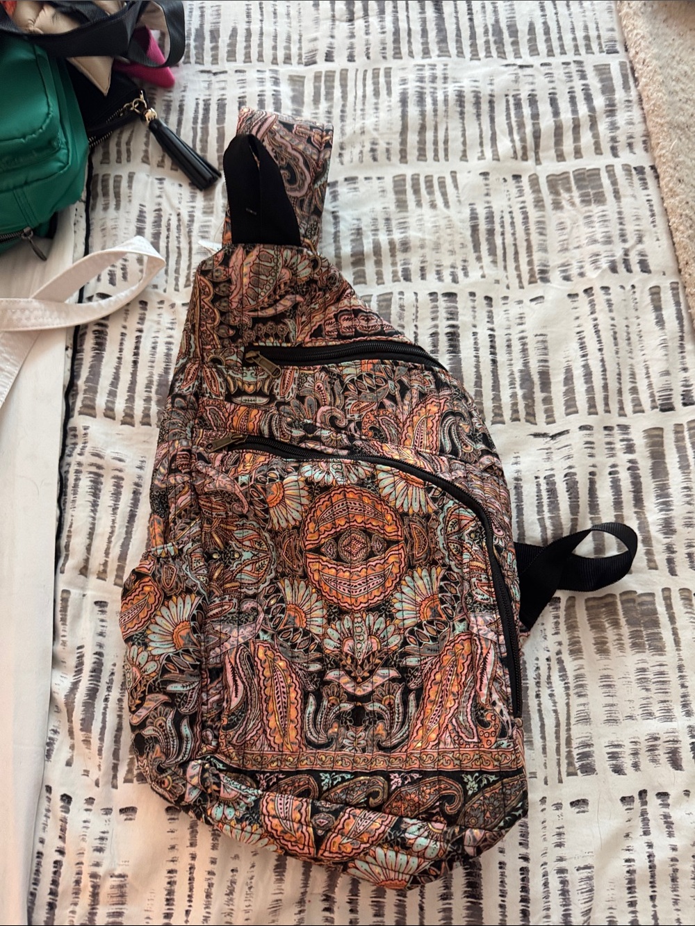 Patterned Paisley Sling Backpack in Orange & Teal